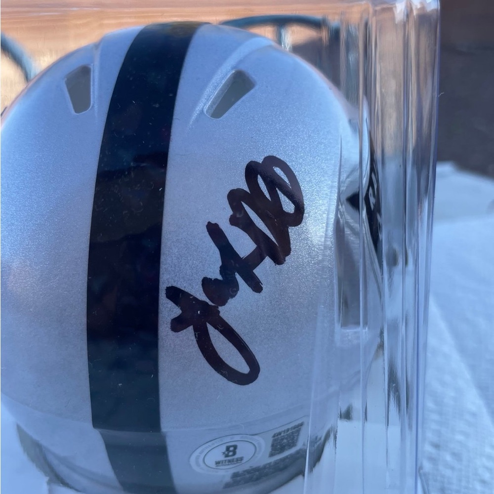 Jamarcus Russell sign mini helmet